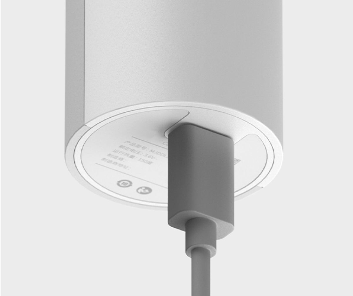 USB-C charging cable connected to the base of HOTO Lithium Glue Gun
