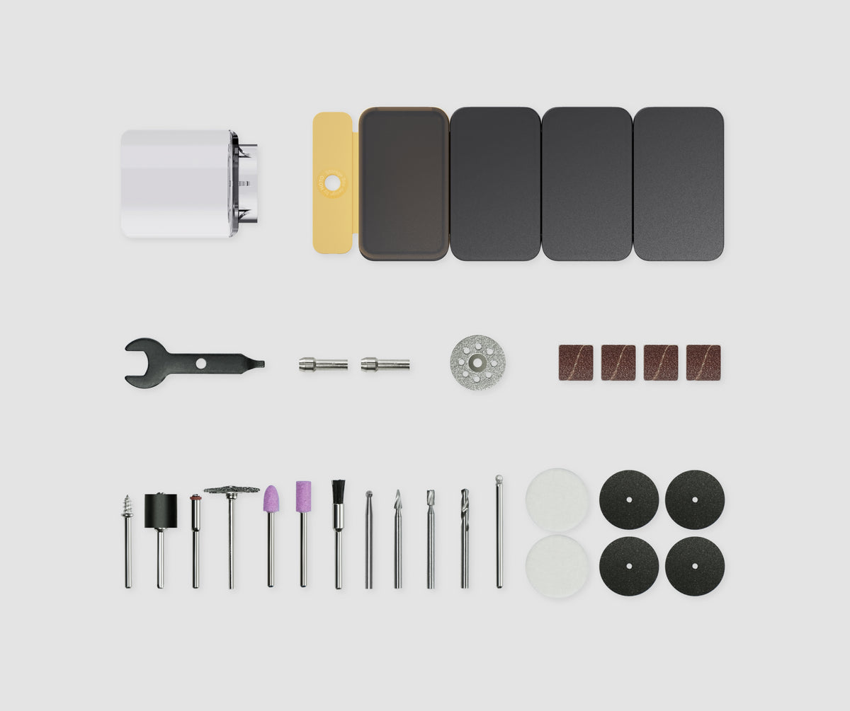 HOTO 35-in-1 rotary tool accessories arranged beside five connected storage boxes