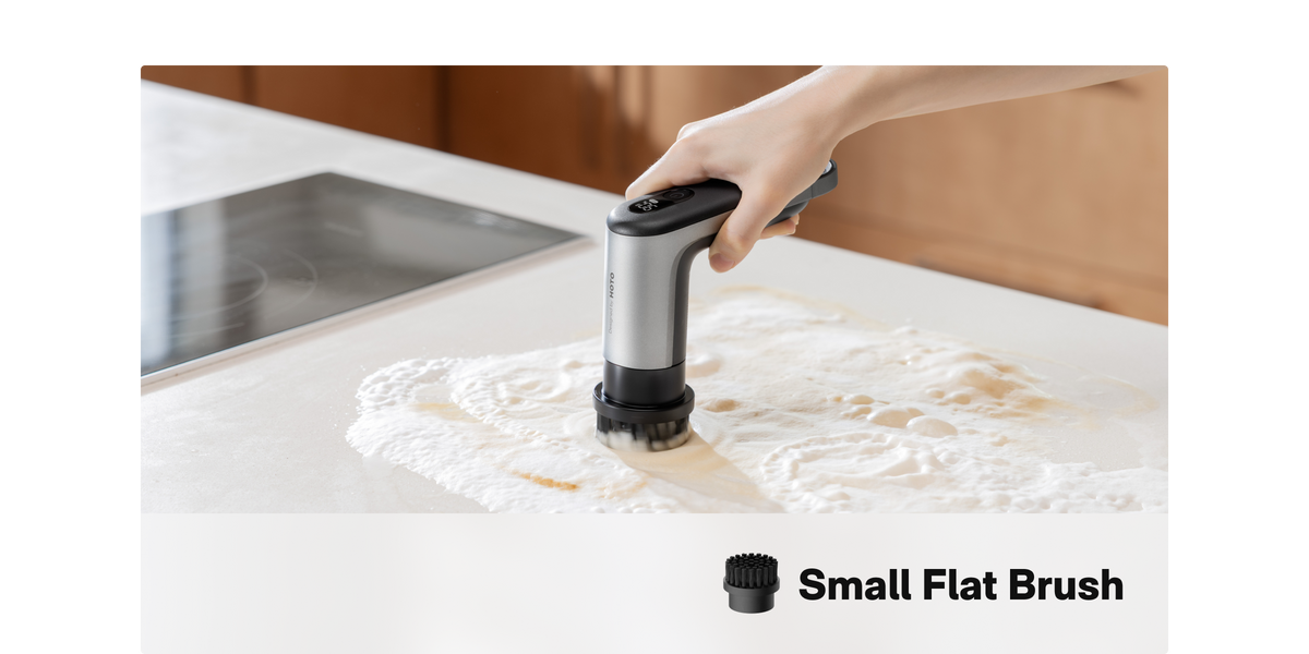 Small flat brush cleaning a kitchen work surface