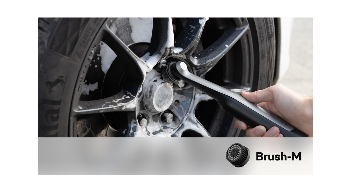 Medium Brush-M cleaning a car wheel